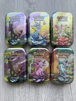 Pokemon TCG Scarlet & Violet Prismatic Evolutions Mini Tin Sealed - Lot Of 6 - Image 1