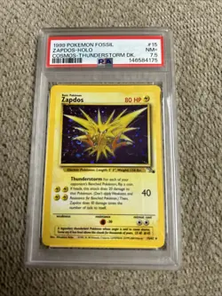 PSA 7.5 Zapdos Holo Fossil Cosmos Thunderstorm DK. Pokemon TCG - Image 1