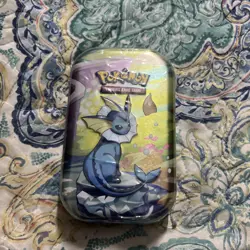 Pokemon TCG Vaporeon Mini Tin Prismatic Evolutions - Image 1