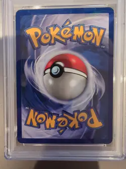 1999 POKEMON FOSSIL #19 DRAGONITE 1ST EDITION - Image 2