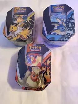Last Chance! Delist on 4/3 Pokemon TCG Eevee Evolutions Tins (Set of 3) - Image 1