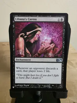Liliana's Caress LIST 103/249 Normal English NM - MTG - Image 1