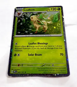 Pokemon TCG Leafeon 005/131 Prismatic Evolutions PERFECT Cosmos Holo Rare - Image 3
