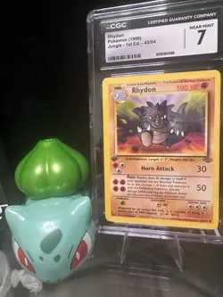 Pokemon TCG Rhydon 45/64 Jungle 1st Edition Uncommon CGC 7 100 HP 1999 - Image 1