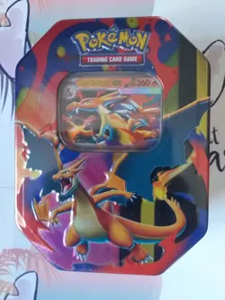 THE POKEMON TCG: MEGA CHARIZARD TIN - Image 1