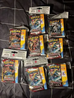 Sealed Pokemon Sun & Moon Crimson Invasion Booster Packs with Collector’s Album - Image 1