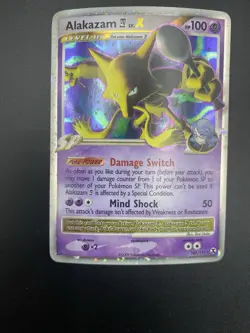 Alakazam LV. X 103/111 Holo Ultra Rare Rising Rivals Pokemon NM Card 2009 SWIRL - Image 1