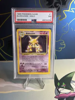 1999 POKEMON GAME #1 ALAKAZAM-HOLO PSA 7 - Image 1