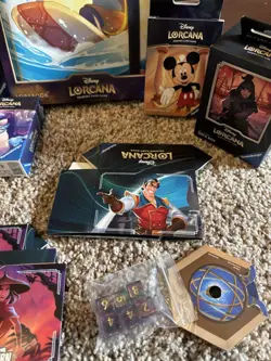 Disney Lorcana Lorebook, card boxes, card sleeves & accessories lot - Image 4