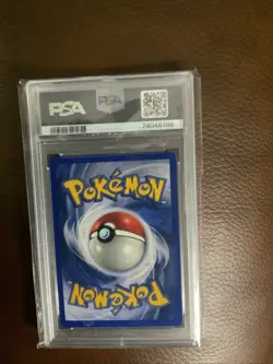 1999 Pokemon Game Alakazam Holo Shadowless #1 PSA-7 - Image 2