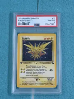 1999 Pokemon Fossil Zapdos Holo 1st Edition PSA 8 - Image 1
