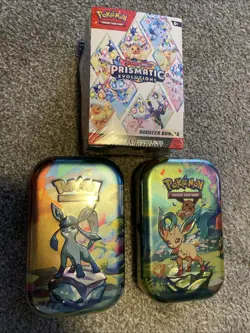 Pokemon TCG Prismatic Evolutions 1 Booster Bundle Box and 2 Tin Lot - Image 1