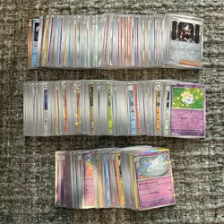 Pokemon Surging Sparks Bulk Lot +250 Holo And Reverse Holo With Trainer Cards - Image 1