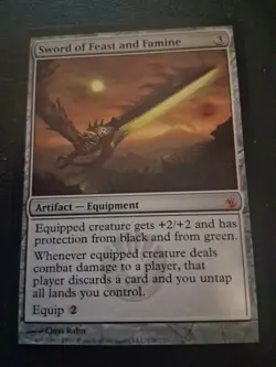 Sword of Feast and Famine Mirrodin Besieged Regular - Image 1