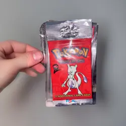 WOTC Pokemon Base Set 2 Mewtwo Art (SEALED) Booster Pack 2000 Long Crimp - Image 1