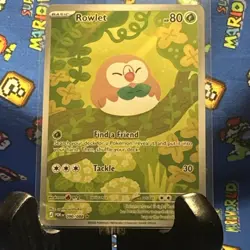 Pokemon Rowlet Grass Card POR 090/088 HP 80 2023 Pokemon TCG English Standard - Image 1