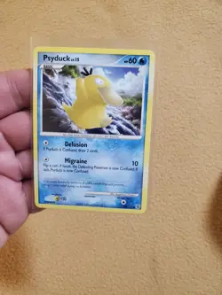 LP Psyduck 100/132 Common Secret Wonders Pokemon Card - Image 1