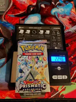 Pokemon Scarlet & Violet Prismatic Evolutions Sealed Booster Weighs 22.46 grams! - Image 1