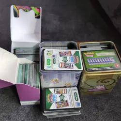 1000 + Pokemon TCG Code Cards From All Different Eras Plus 2 Metal Tins - Image 1
