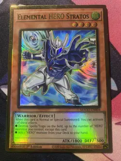 Yu-Gi-Oh! Elemental HERO Stratos MAGO-EN004 Maximum Gold 1st Edition NM - Image 1