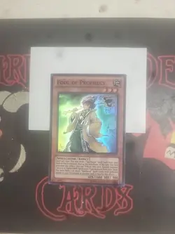 Yu-Gi-Oh TCG CBLZ-EN035 "Fool Of Prophecy" Unlimited SUPER RARE NM - Image 1