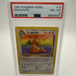 1999 POKEMON FOSSIL #19 DRAGONITE NON HOLO UNLIMITED MINT PSA 8 - Image 1