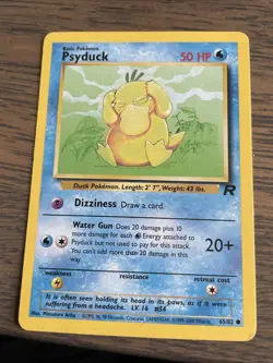 PSYDUCK #65/82 TEAM ROCKET POKEMON - Image 1