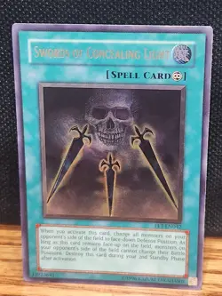Yu-Gi-Oh! Ultimate Rare Swords of Concealing Light FET-EN042. NM - Image 1