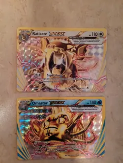 Pokemon 2016 Raticate (89/122) and Omastar (19/122) Gold BREAK Cards - Image 1
