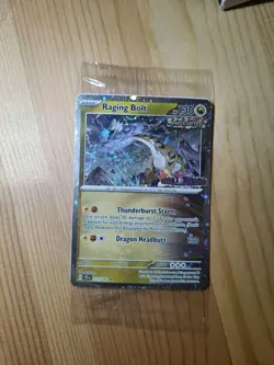 Pokemon Raging Bolt 111/142 Stellar Crown Stamped Sealed Best Buy Promo Card - Image 1