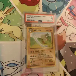 PSA 7 1997 pocket monsters Japanese jungle marowak #105 Pokemon WOTC TCG card . - Image 1