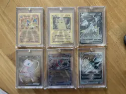 Pokemon Celebrations Gold Metal Charizard & Pikachu 25th Anniversary Plus Extra - Image 1