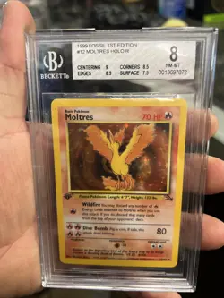 1999 Pokemon Fossil Moltres #12 Holo 1st Edition BGS 8 Vintage Rare - Image 1