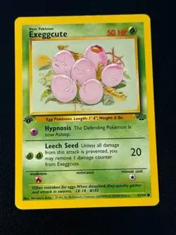 Exeggcute 52/64 Pokemon Jungle 1st Edition - Image 1
