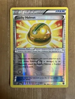2015 Pokemon Ancient Origins Lucky Helmet Reverse Holo 77/98 NM - Image 1
