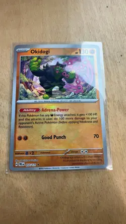 Okidogi ( Pattern) Rare Prismatic Evolutions 057/131 NM Master Ball Pokemon - Image 1