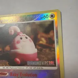 Happiny 52/123 Reverse Holo Pokemon Card Diamond & Pearl 2007 Stamped - Image 2