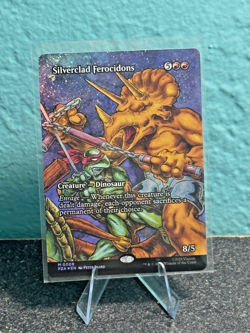 Silverclad Ferocidons (Borderless) #9 (Foil) (NM) PZA Magic MTG - Image 1