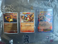 Charmander 004/025 + Charmeleon 017/025 + Mega Charizard EX XY121 pokemon cards - Image 1