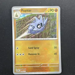Pupitar - 048/131 - Poke Ball - Prismatic Evolutions - Pokemon Card - Image 1