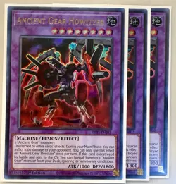 Yugioh! 3x Ancient Gear Howitzer RA03-EN035 Ultra Rare 1st Ed NM - Image 1