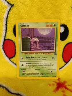 Vintage Pokemon Card Base Set Fossil Grimer - Image 1