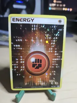 SWIRL Fighting Energy 106/106 Cosmos Holo Pokemon Card Emerald - Image 1