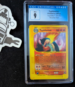 CGC 9 MINT Typhlosion 2002 Expedition 28/165 Reverse Holo Pokemon Card Graded - Image 1