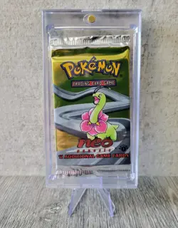 Pokemon Neo Genesis 1st Edition Booster Pack SEALED with Acrylic Holder - Image 1