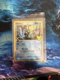 2021 NM Pokemon TCG Mimikyu Delta Holo SWSH136 25th Celebrations Collection - Image 1
