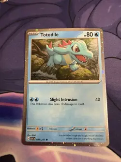 Totodile Cosmos Holo SWIRL 041/217 Pokemon - ME: Holo Bleed Error Swirl Promo NM - Image 1