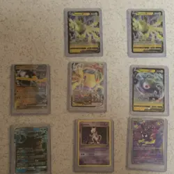 Pokemon TCG 8 Card Lot + Top Loader Binder - Image 1