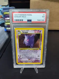 1999 POKEMON FOSSIL #5 GENGAR-HOLO PSA 7 - Image 1