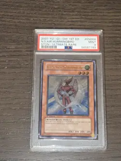 Yugioh Neo-Spacian Air Hummingbird Ultimate Rare 1st Edition PSA 9 STON-EN004. - Image 1